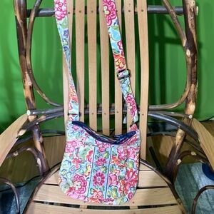 Vera Bradley multi colored crossbody bag.